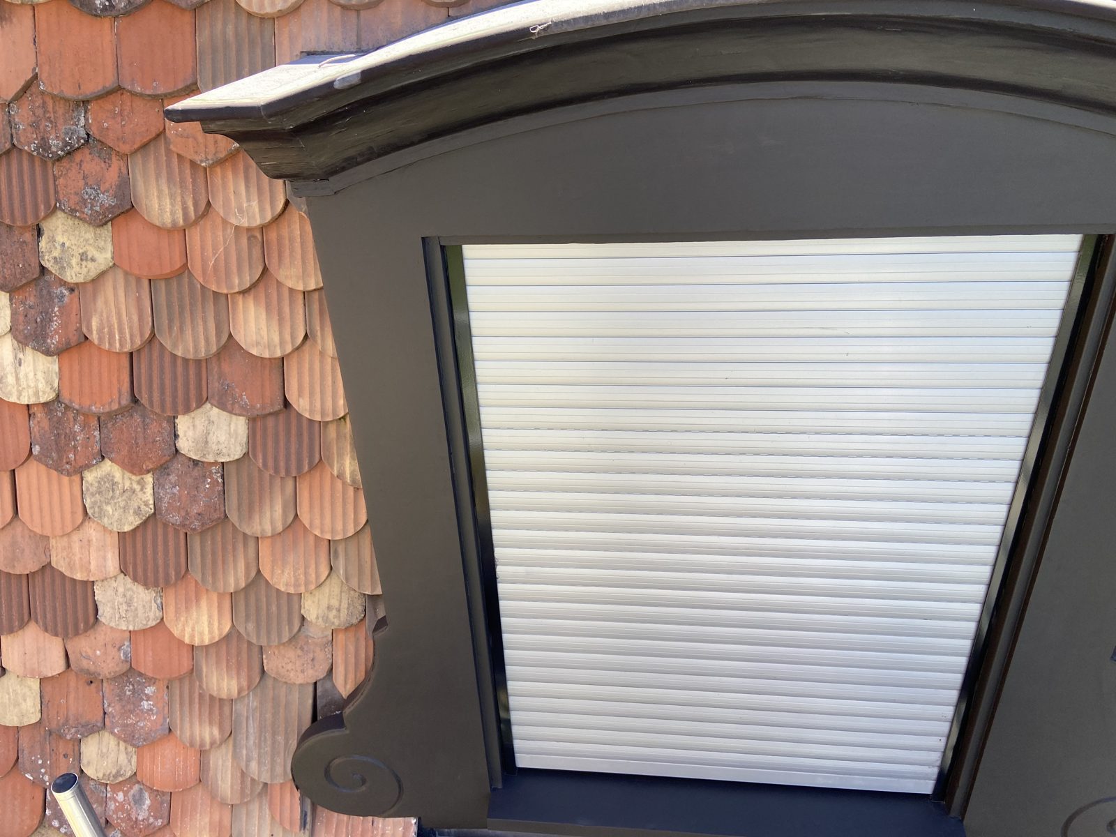 Traditional tiled roof and shutters
