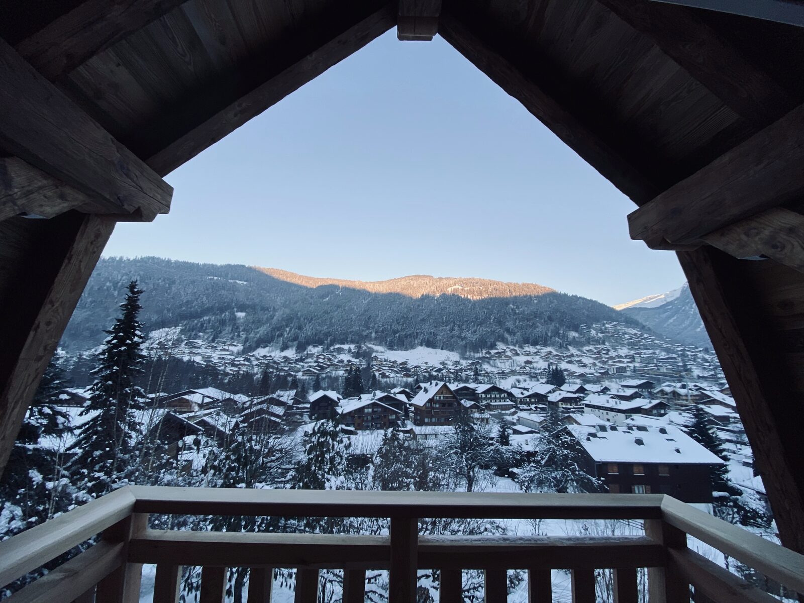Balcony view over the snowy valley