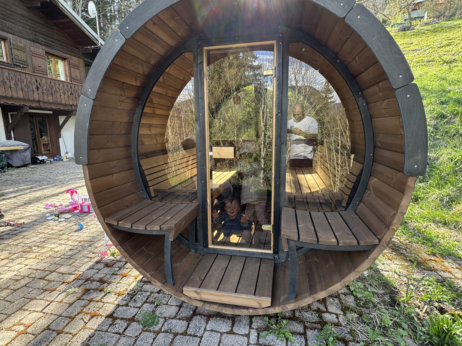 An outdoor barrel sauna